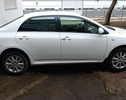 Білий Тойота Королла, об'ємом двигуна 1.6 л та пробігом 189 тис. км за 6600 $, фото 1 на Automoto.ua