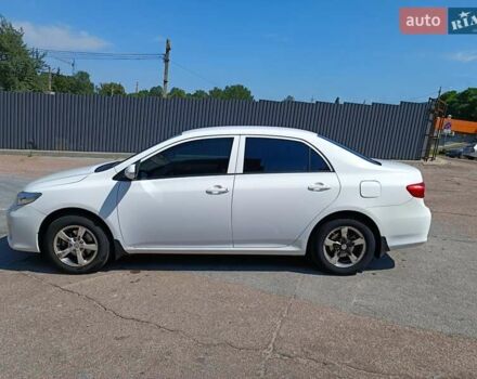 Білий Тойота Королла, об'ємом двигуна 1.33 л та пробігом 230 тис. км за 6200 $, фото 3 на Automoto.ua