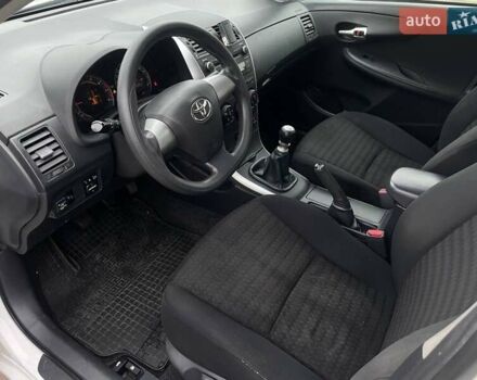 Белый Тойота Королла, объемом двигателя 1.33 л и пробегом 189 тыс. км за 7199 $, фото 12 на Automoto.ua