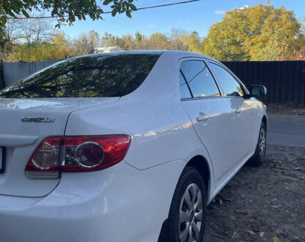 Белый Тойота Королла, объемом двигателя 1.33 л и пробегом 143 тыс. км за 7000 $, фото 5 на Automoto.ua