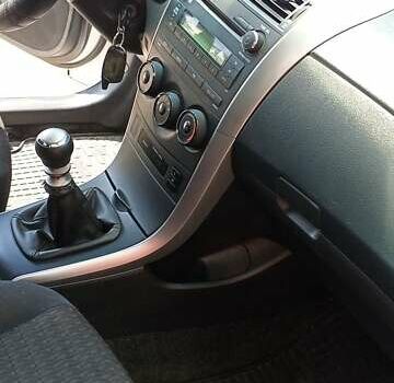 Білий Тойота Королла, об'ємом двигуна 1.3 л та пробігом 213 тис. км за 7250 $, фото 6 на Automoto.ua