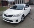 Белый Тойота Королла, объемом двигателя 1.3 л и пробегом 198 тыс. км за 7450 $, фото 1 на Automoto.ua