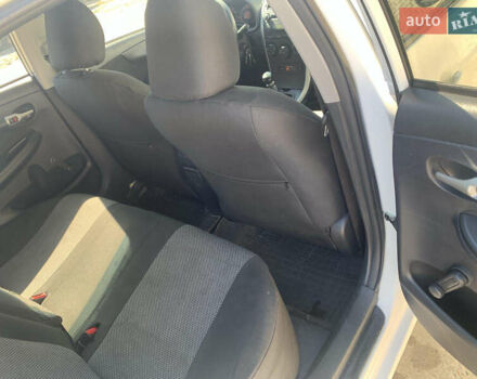 Белый Тойота Королла, объемом двигателя 1.3 л и пробегом 350 тыс. км за 4200 $, фото 10 на Automoto.ua