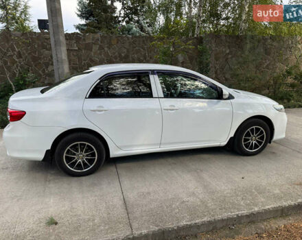 Белый Тойота Королла, объемом двигателя 1.33 л и пробегом 188 тыс. км за 6600 $, фото 2 на Automoto.ua