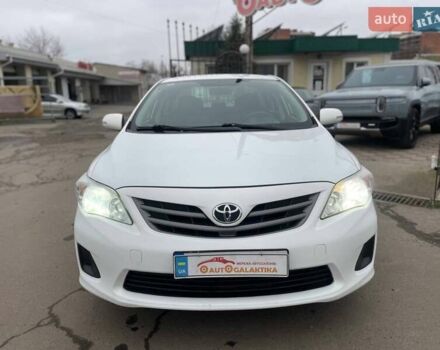 Белый Тойота Королла, объемом двигателя 1.33 л и пробегом 189 тыс. км за 7199 $, фото 1 на Automoto.ua