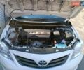 Білий Тойота Королла, об'ємом двигуна 1.33 л та пробігом 230 тис. км за 6200 $, фото 8 на Automoto.ua
