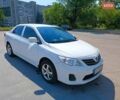 Білий Тойота Королла, об'ємом двигуна 1.33 л та пробігом 230 тис. км за 6200 $, фото 1 на Automoto.ua