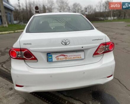 Белый Тойота Королла, объемом двигателя 1.33 л и пробегом 189 тыс. км за 7199 $, фото 4 на Automoto.ua