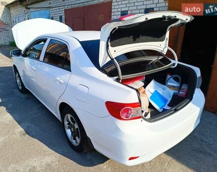 Білий Тойота Королла, об'ємом двигуна 1.33 л та пробігом 230 тис. км за 6200 $, фото 6 на Automoto.ua