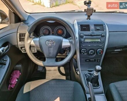 Білий Тойота Королла, об'ємом двигуна 1.33 л та пробігом 230 тис. км за 6200 $, фото 15 на Automoto.ua