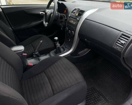 Белый Тойота Королла, объемом двигателя 1.33 л и пробегом 189 тыс. км за 7199 $, фото 21 на Automoto.ua