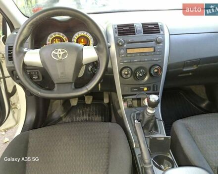 Белый Тойота Королла, объемом двигателя 1.33 л и пробегом 223 тыс. км за 6900 $, фото 11 на Automoto.ua