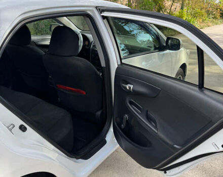 Белый Тойота Королла, объемом двигателя 1.33 л и пробегом 188 тыс. км за 6600 $, фото 17 на Automoto.ua