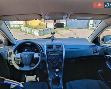 Білий Тойота Королла, об'ємом двигуна 1.33 л та пробігом 230 тис. км за 6200 $, фото 16 на Automoto.ua