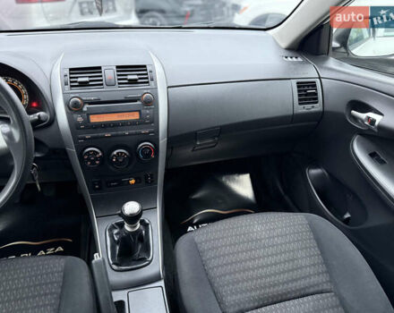 Белый Тойота Королла, объемом двигателя 1.3 л и пробегом 117 тыс. км за 8500 $, фото 34 на Automoto.ua