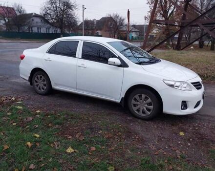 Білий Тойота Королла, об'ємом двигуна 1.33 л та пробігом 96 тис. км за 9800 $, фото 2 на Automoto.ua