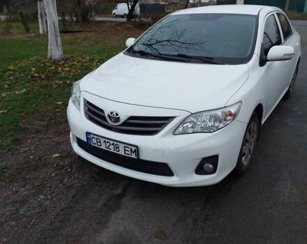 Білий Тойота Королла, об'ємом двигуна 1.33 л та пробігом 96 тис. км за 9800 $, фото 1 на Automoto.ua