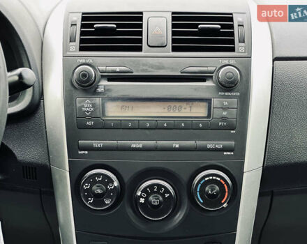 Білий Тойота Королла, об'ємом двигуна 1.33 л та пробігом 243 тис. км за 7399 $, фото 26 на Automoto.ua