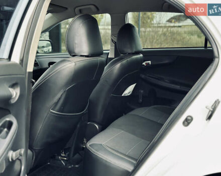 Білий Тойота Королла, об'ємом двигуна 1.33 л та пробігом 243 тис. км за 7399 $, фото 14 на Automoto.ua