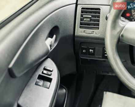 Білий Тойота Королла, об'ємом двигуна 1.33 л та пробігом 243 тис. км за 7399 $, фото 32 на Automoto.ua