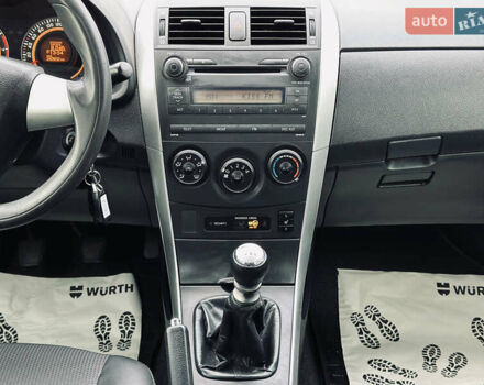 Білий Тойота Королла, об'ємом двигуна 1.33 л та пробігом 243 тис. км за 7399 $, фото 21 на Automoto.ua