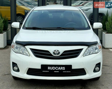 Білий Тойота Королла, об'ємом двигуна 1.33 л та пробігом 243 тис. км за 7399 $, фото 1 на Automoto.ua