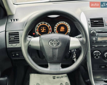 Білий Тойота Королла, об'ємом двигуна 1.33 л та пробігом 243 тис. км за 7399 $, фото 29 на Automoto.ua