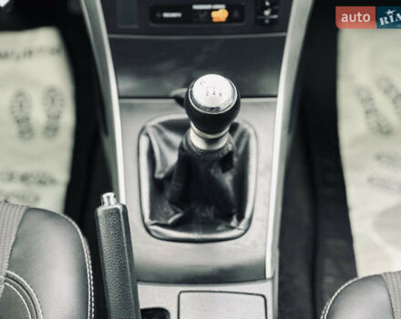 Білий Тойота Королла, об'ємом двигуна 1.33 л та пробігом 243 тис. км за 7399 $, фото 27 на Automoto.ua