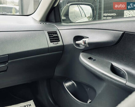 Білий Тойота Королла, об'ємом двигуна 1.33 л та пробігом 243 тис. км за 7399 $, фото 22 на Automoto.ua