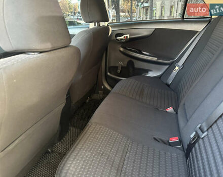 Белый Тойота Королла, объемом двигателя 1.3 л и пробегом 175 тыс. км за 7800 $, фото 13 на Automoto.ua