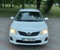 Білий Тойота Королла, об'ємом двигуна 1.3 л та пробігом 202 тис. км за 7400 $, фото 1 на Automoto.ua