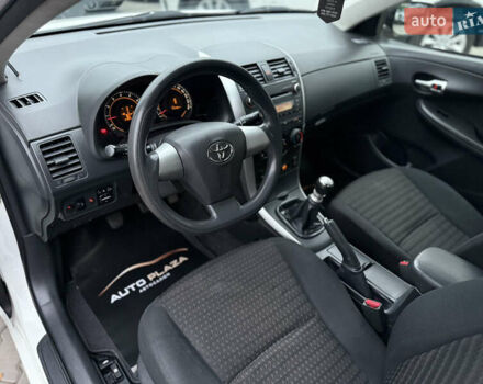 Белый Тойота Королла, объемом двигателя 1.3 л и пробегом 117 тыс. км за 8500 $, фото 25 на Automoto.ua