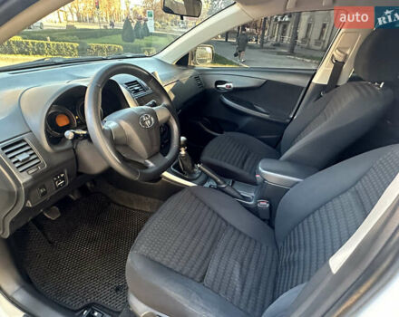 Белый Тойота Королла, объемом двигателя 1.3 л и пробегом 175 тыс. км за 7800 $, фото 7 на Automoto.ua