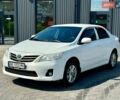 Білий Тойота Королла, об'ємом двигуна 1.33 л та пробігом 180 тис. км за 6500 $, фото 1 на Automoto.ua