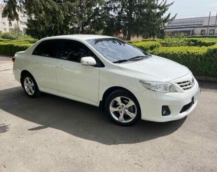 Белый Тойота Королла, объемом двигателя 1.6 л и пробегом 178 тыс. км за 11300 $, фото 1 на Automoto.ua