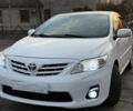 Білий Тойота Королла, об'ємом двигуна 1.6 л та пробігом 245 тис. км за 10800 $, фото 4 на Automoto.ua