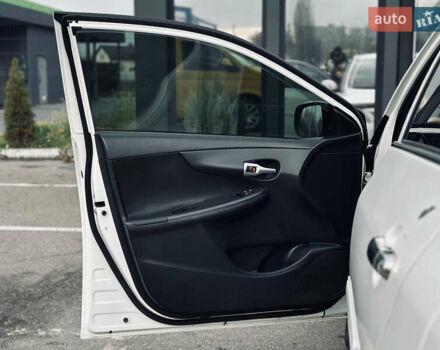 Білий Тойота Королла, об'ємом двигуна 1.33 л та пробігом 243 тис. км за 7399 $, фото 15 на Automoto.ua