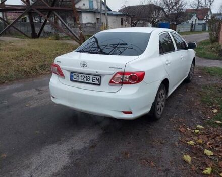 Білий Тойота Королла, об'ємом двигуна 1.33 л та пробігом 96 тис. км за 9800 $, фото 4 на Automoto.ua