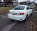 Білий Тойота Королла, об'ємом двигуна 1.33 л та пробігом 96 тис. км за 9800 $, фото 4 на Automoto.ua