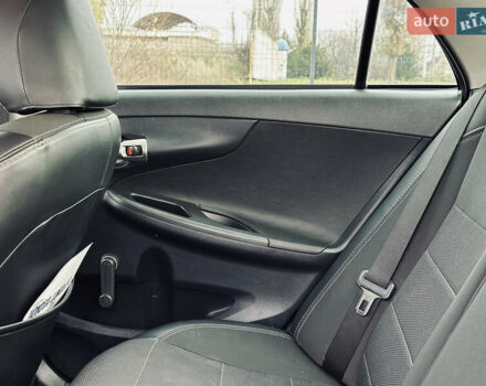 Білий Тойота Королла, об'ємом двигуна 1.33 л та пробігом 243 тис. км за 7399 $, фото 12 на Automoto.ua