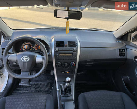 Белый Тойота Королла, объемом двигателя 1.3 л и пробегом 184 тыс. км за 7000 $, фото 13 на Automoto.ua