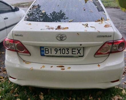 Белый Тойота Королла, объемом двигателя 1.33 л и пробегом 243 тыс. км за 7600 $, фото 2 на Automoto.ua