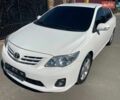 Білий Тойота Королла, об'ємом двигуна 1.6 л та пробігом 180 тис. км за 10650 $, фото 1 на Automoto.ua