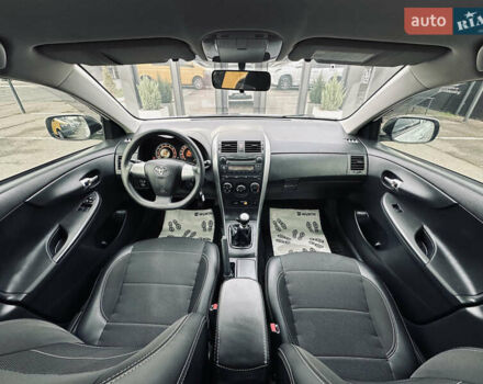 Білий Тойота Королла, об'ємом двигуна 1.33 л та пробігом 243 тис. км за 7399 $, фото 31 на Automoto.ua