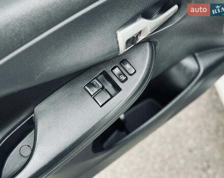 Білий Тойота Королла, об'ємом двигуна 1.33 л та пробігом 243 тис. км за 7399 $, фото 16 на Automoto.ua