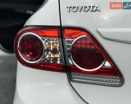 Білий Тойота Королла, об'ємом двигуна 1.33 л та пробігом 243 тис. км за 7399 $, фото 10 на Automoto.ua