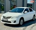 Белый Тойота Королла, объемом двигателя 1.33 л и пробегом 180 тыс. км за 7000 $, фото 1 на Automoto.ua