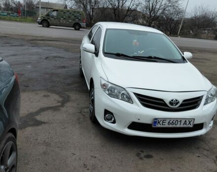 Белый Тойота Королла, объемом двигателя 1.3 л и пробегом 250 тыс. км за 7000 $, фото 1 на Automoto.ua