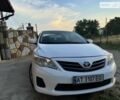 Белый Тойота Королла, объемом двигателя 1.33 л и пробегом 300 тыс. км за 6000 $, фото 1 на Automoto.ua