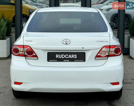 Білий Тойота Королла, об'ємом двигуна 1.33 л та пробігом 243 тис. км за 7399 $, фото 4 на Automoto.ua
